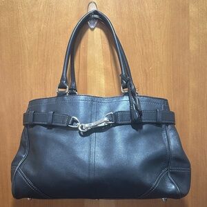 This is a Coach Hamptons leather shoulder bag.